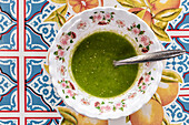 Traditional Mexican green salsa in a decorative bowl