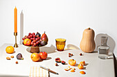 Elegant autumn fruit arrangement on a sunlit table