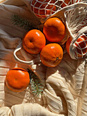 Fresh mandarins from above in a cosy knitted set