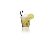 Classic Caipirinha cocktail with lime and crushed ice in a glass on a reflective white background