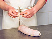 Butchers preparing the traditional sobrasada sausage