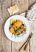 Salmon fillets on pointed cabbage and buckwheat risotto