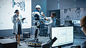 Engineers working on bionic exoskeleton