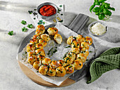 Baked mozzarella balls with cold tomato sauce