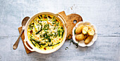 Kohlrabi and asparagus gratin with potatoes