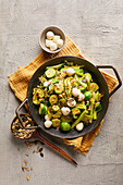 Green vegetable and oat pan with mini mozzarella