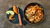 Quick apple and carrot salad with walnuts