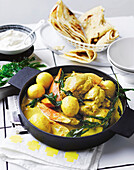 Chicken and coconut curry with sweet potato and egg