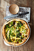 Colourful cabbage puff pastry quiche with parmesan