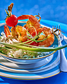 Prawns in agave syrup with spring onions on rice