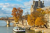 France, Paris, area listed as World Heritage by UNESCO, the banks of Seine river the quays of the Louvre in autumn