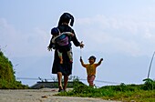 Vietnam, Ha Giang province, Hoang Su Phi, La Chi ethnic woman with her child