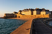 France, Ille et Vilaine, Saint Malo, Mole Beach, ramparts and walled city at sunset