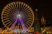 France, Nord, Lille, the Ferris wheel and Christmas lights on the Place du General de Gaulle