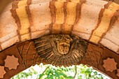 France, Haute Savoie, Rumilly, Vaulx, secret gardens, remarkable garden label, detail of a lime mortar arch covered with a wooden sculpture