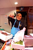 France, Indre et Loire, Loire valley listed as World Heritage by UNESCO, Tours, market hall, fishmonger showing an eel, Gabillet house