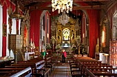 Spain, Canary Islands, Palma Island, couple inside a richly decorated baroque church