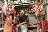 France, Indre et Loire, Loire valley listed as World Heritage by UNESCO, Tours, market hall, butcher in his cold room