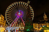 France, Nord, Lille, the Ferris wheel and Christmas lights on the Place du General de Gaulle