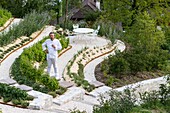 France, Haute-Savoie, Annecy, three-star chef Laurent Petit in the garden of his restaurant Le Clos des Sens