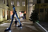 France, Cote d'Or, Dijon, area listed as World Heritage by UNESCO, Cour Bareuzai shopping arcade in the former Hotel des Godrans dating from the 15th century, statue of the artist Nathalie Decoster, La Trace du Temps