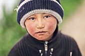 Kyrgyzstan, Osh province, Sary-Moghul, portrait of a young boy