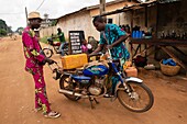 Benin, Ouidah, gasoline smuggler on the road to Nigeria to take some cheaper gasoline