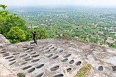 Benin, Dassa-Zoumé, Dassa mountains The holes on the top are showing how inhabitants escaping slavers and living there would grind their cereals by rubbing them with a stone on the rock