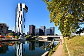 France, Bas Rhin, Strasbourg, development of port du Rhin (Rhine's harbour) and conversion of breakwater of Bassin d'Austerlitz, the 3 Black Swans tower of architect Anne Demians and the Elithis Danube Tower, 1st positive energy tower by XTU Architects