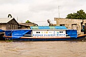 Benin, lakeside city of Ganvié, family planning boat