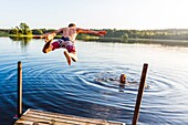 Sweden, County of Vastra Gotaland, Hokerum, Ulricehamn hamlet, Rochat family report, sunday family relaxation in one of the lakes around the house