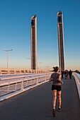 France, Gironde, Bordeaux, the Jacques Chaban Delmas lifting bridge spans the Garonne, it benefits from the last rays of the sun