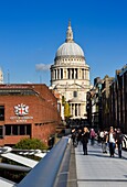 United Kingdom, London, The City, St. Paul's Cathedral seen from the Millennium Bridge by architect Norman Foster on the Thames river, the City of London School