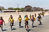 Namibia, Kavango province, Divundu, school children leaving the school