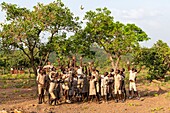 Benin, Nothern distict, Atacora mountains area, Koussoukoingou, children playing in front of school