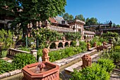 France, Haute Savoie, Rumilly, Vaulx, secret gardens, remarkable garden label, fountains in mortar mold and lime carving in the Andalusian garden, overview