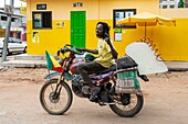 Benin, Cotonou, itinerant garage mechanic motorcycle