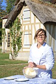 France, Oise, Chantilly, Domaine de Chantilly, restaurant du Hameau, Isabelle Duda making homemade whipped cream