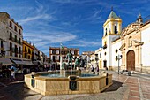 Spain, Andalusia, Malaga Province, Ronda, white villages road (Ruta de los Pueblos Blancos), Plaza del Socorro, Fountain and church Iglesia del Socorro