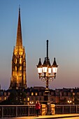 France, Gironde, Bordeaux, area listed as World Heritage by UNESCO, the Pont de Pierre over the Garonne, at the bottom the spire of the Saint-Michel Basilica in Bordeaux