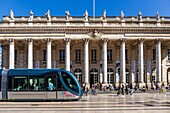 France, Gironde, Bordeaux, area classified as World Heritage by UNESCO, the Golden Triangle, Quinconces district, Place de la Comédie, TBM network tram in front of the Grand-Théâtre, built by architect Victor Louis from 1773 to 178