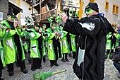 Switzerland, Valais, Evolene valley, Evolene, Carnaval with the Empailles and the Peluches who come from Pagan rites and go around the villages to frighten the bad spirits of winter, Guggenmusic group