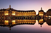 France, Gironde, Bordeaux, area classified as World Heritage by UNESCO, Saint-Pierre district, tram on the Place de la Bourse, the reflecting pool dating from 2006 and made by the fountain maker Jean-Max Llorca