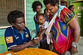 Papua-Neuguinea, Provinz East Sepik, Sepik River Region, Wewak City, Massenimpfung gegen Poliomyelitis im Rahmen der Kampagne zur Ausrottung der Epidemie 2019, Kennzeichnung der geimpften Kinder