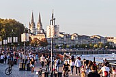 France, Gironde, Bordeaux, area listed as World Heritage by UNESCO, Quai de la Douane, in the background the towers of the Saint-Louis des Chartrons church