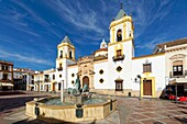 Spain, Andalusia, Malaga Province, Ronda, white villages road (Ruta de los Pueblos Blancos), Plaza del Socorro, Fountain and church Iglesia del Socorro