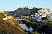 Spain, Andalusia, Cadiz Province, Arcos de la Frontera, White Villages route (Ruta de los Pueblos Blancos), the village on a rocky cliff and Guadalete river