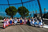 Albania, Gjirokastër, listed as World Heritage by UNESCO, folk troupe rehearsing a traditional dance on the upper terrace of the medieval fortress