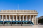 France, Gironde, Bordeaux, area classified as World Heritage by UNESCO, the Golden Triangle, Quinconces district, Place de la Comédie, TBM network tram in front of the Grand-Théâtre, built by architect Victor Louis from 1773 to 178