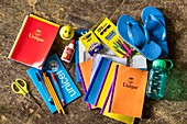 Papua New Guinea, Southern Highlands Province, Lake Kutubu, the contents of a UNICEF school bag